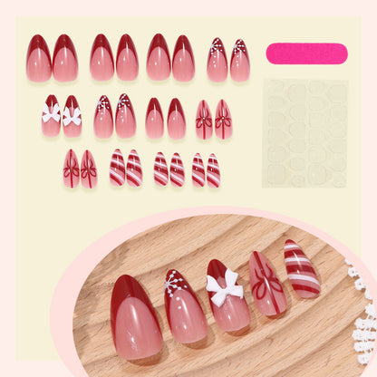 Decorative Press-On Nail Set with Elegant Bow and Striped Designs Acalora