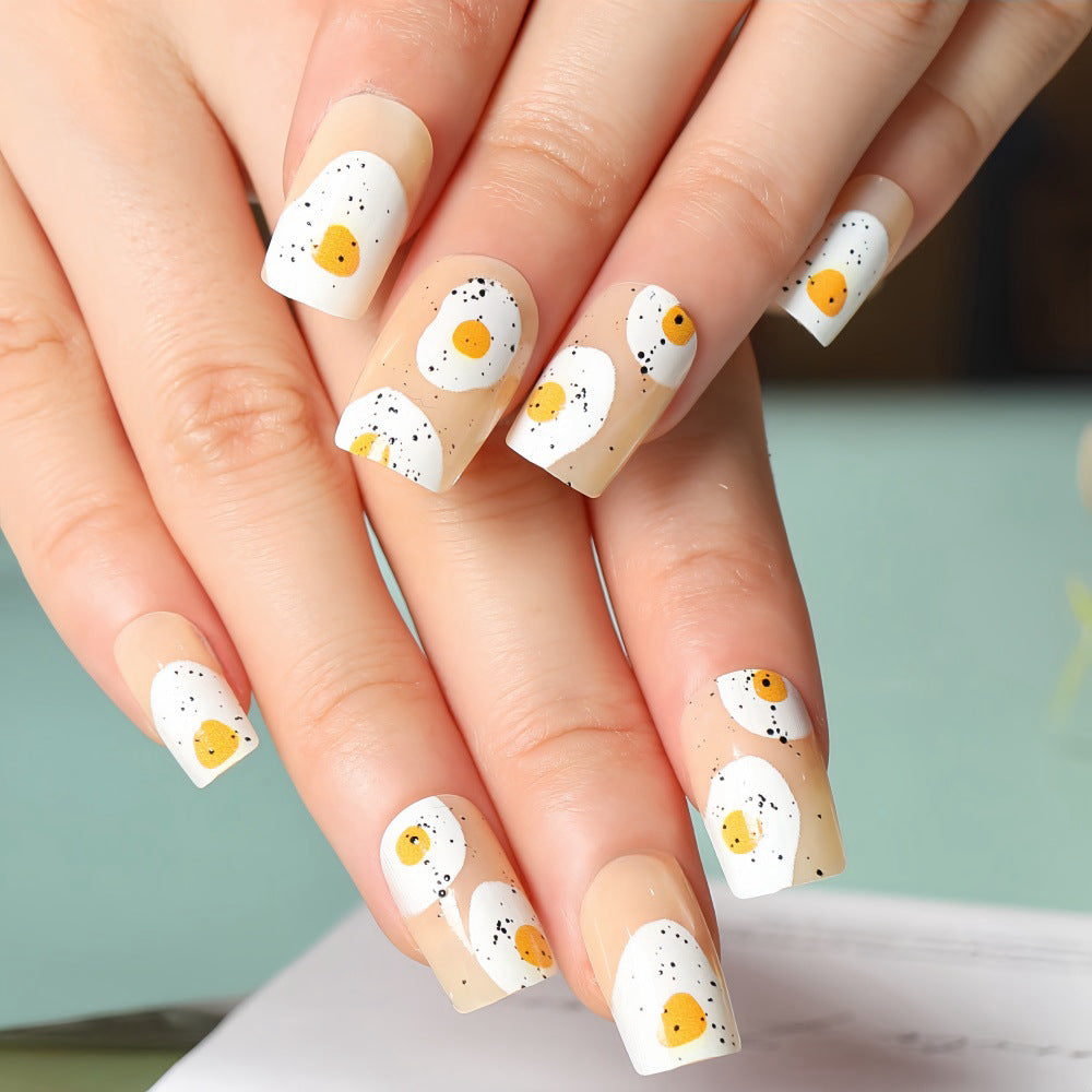 Artificial nails in creative fried egg design Acalora