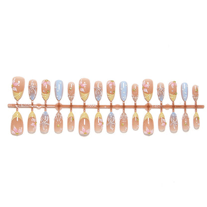 Artificial nail set with floral motifs and glitter accents Acalora