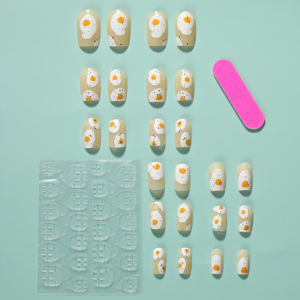 Artificial nails in creative fried egg design Acalora