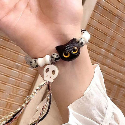 Whimsical Cat and Bone Charm Bracelet Acalora