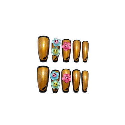 Artificial nails in a playful flower design with glittering accents Acalora