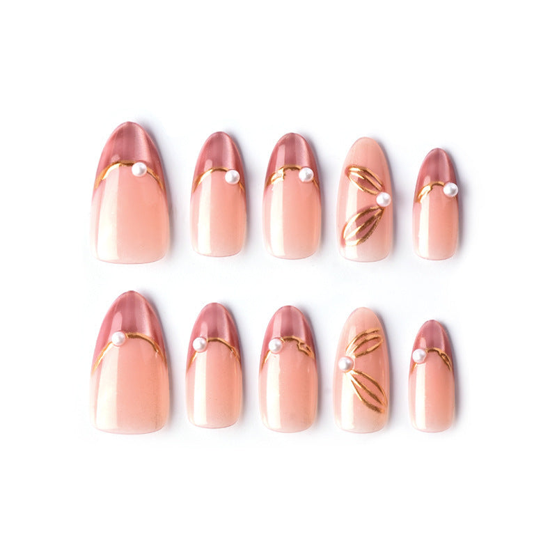 Nail set with glamorous golden accents and elegant design Acalora