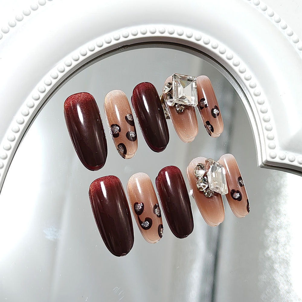 Luxury artificial nails with elegant rhinestone applications Acalora