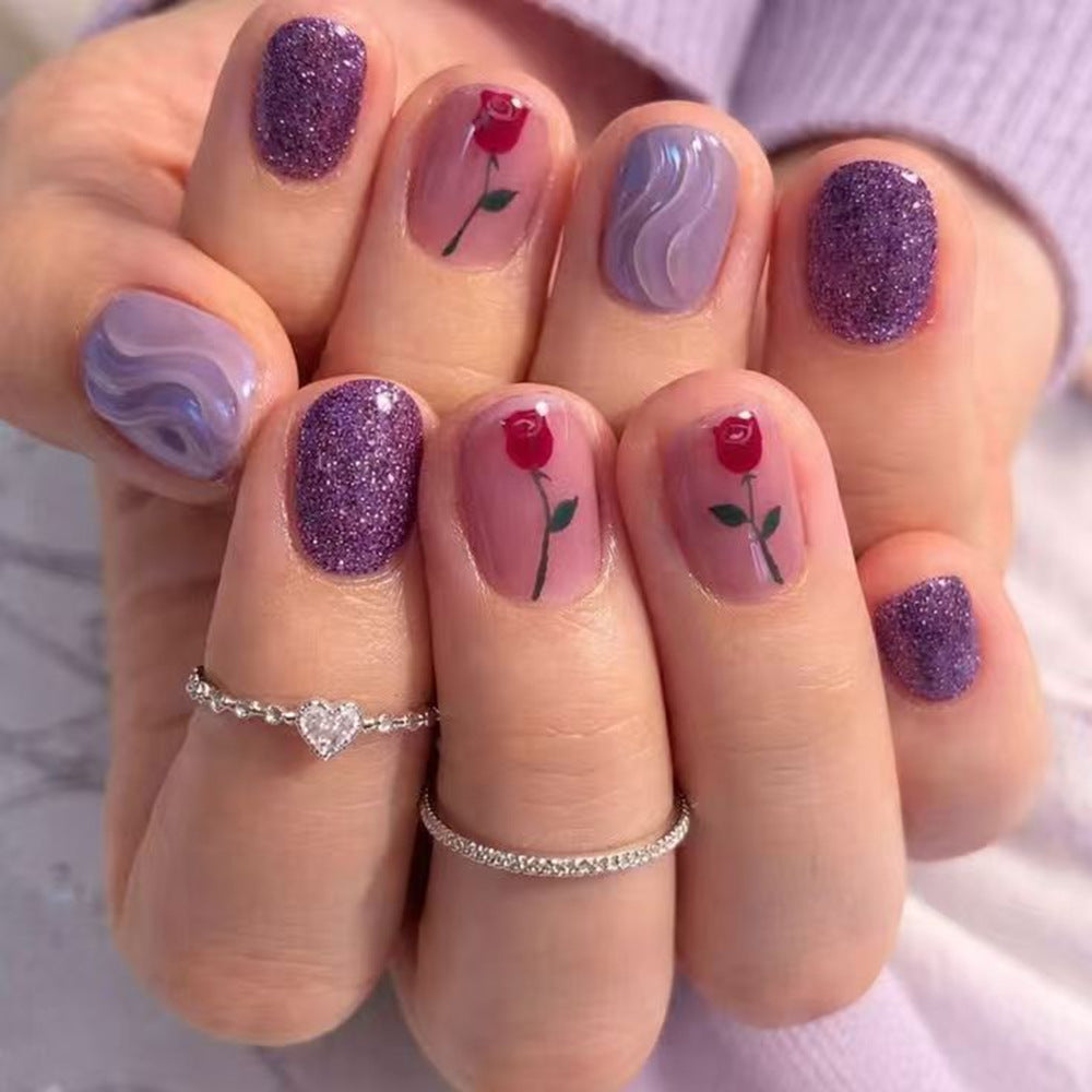 False nails with glamorous glitter design Acalora