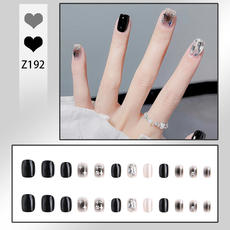 Artificial nail set with glamorous glitter and crystal decorations Acalora