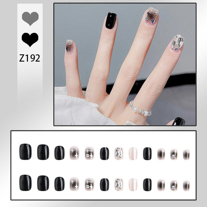 Artificial nail set with glamorous glitter and crystal decorations Acalora