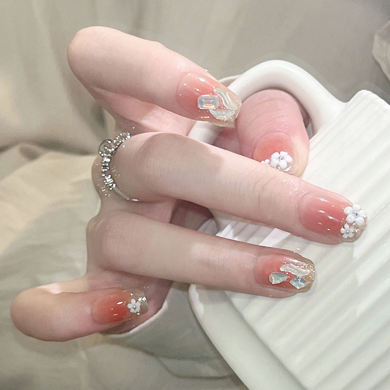 Decorative artificial nail set with elegant flower and glitter elements Acalora