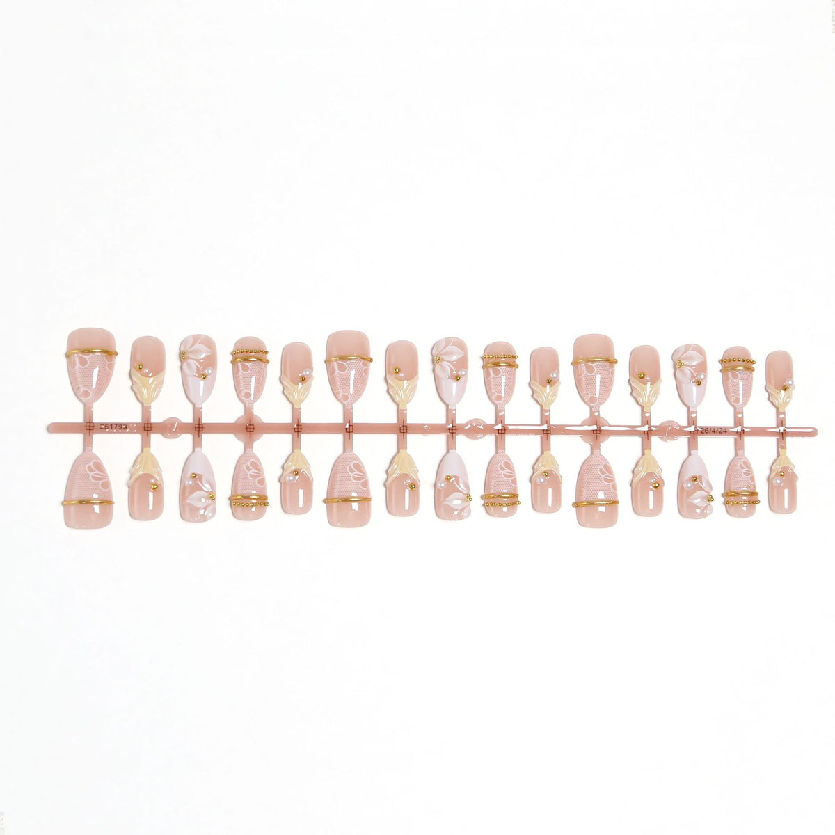 Artificial nail set with enchanting floral details and luxurious gold accents Acalora