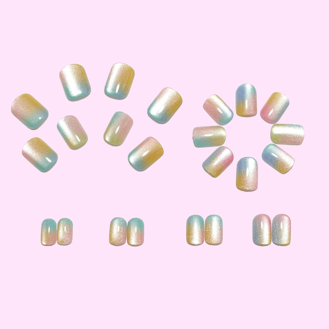 Artificial nails in delicate ombre design with glitter effects Acalora