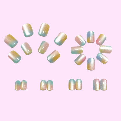 Artificial nails in delicate ombre design with glitter effects Acalora