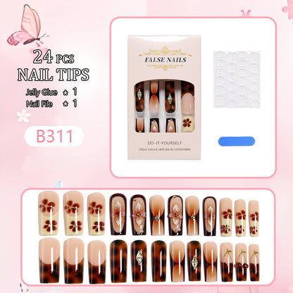 Artificial nails with creative 3D flower design and glitter accents Acalora