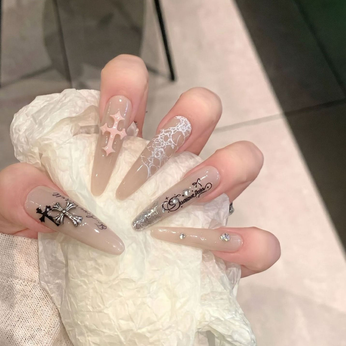 Artistic Stiletto Press-On Nail Set with Unique Design Elements Acalora