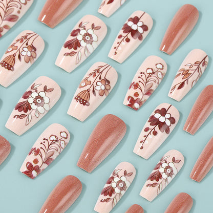 Artificial nails with filigree flower designs Acalora