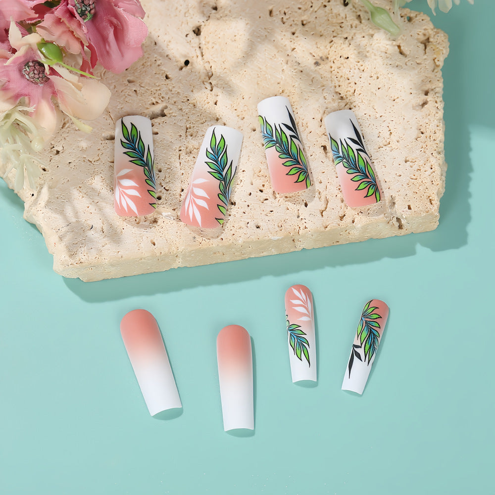 Artificial nails with elegant ombre design and floral accents Acalora