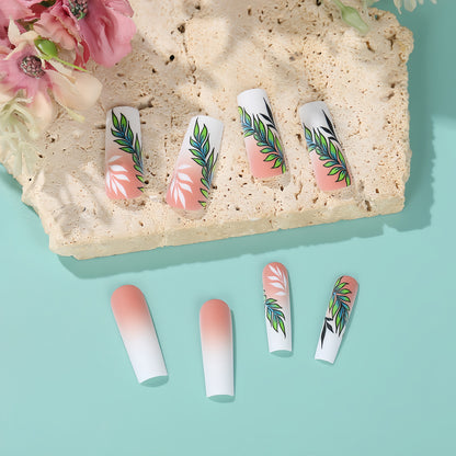 Artificial nails with elegant ombre design and floral accents Acalora