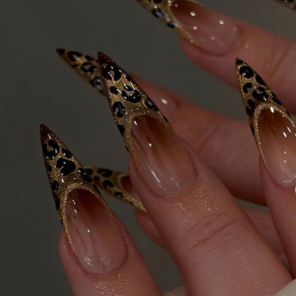 Elegant Stiletto Nail Art Set with Gold and Leopard Accents Acalora