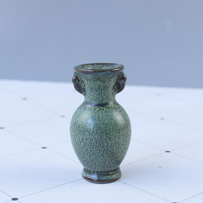 Elegant ceramic vase with artistic design Acalora