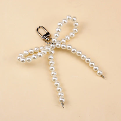 Elegant Pearl Bow Brooch Acalora