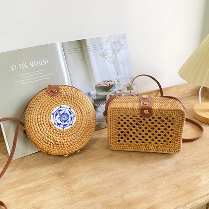 Women's round basket bag with unique ceramic detail Brehn