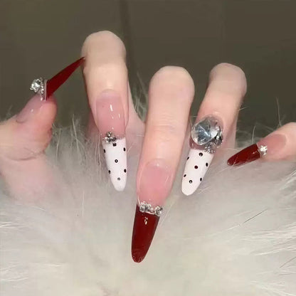 Artificial nail set with festive gift design and elegant glitter accents Acalora