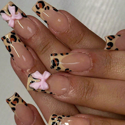 Decorative Stiletto Press-On Nail Art with Animal Print and Bow Accents Acalora