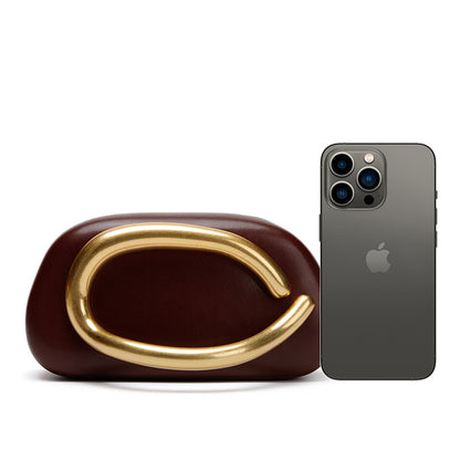 Statement Clutch with Sculptural Handle Acalora