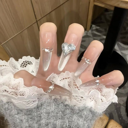 Glamorous artificial nail tips with elegant decorations Acalora