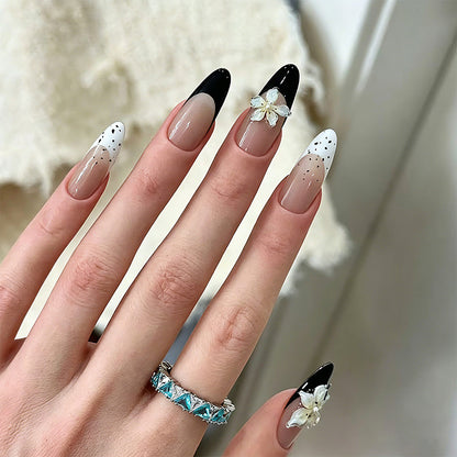 Artificial nail set with glamorous floral designs and creative glitter accents Acalora