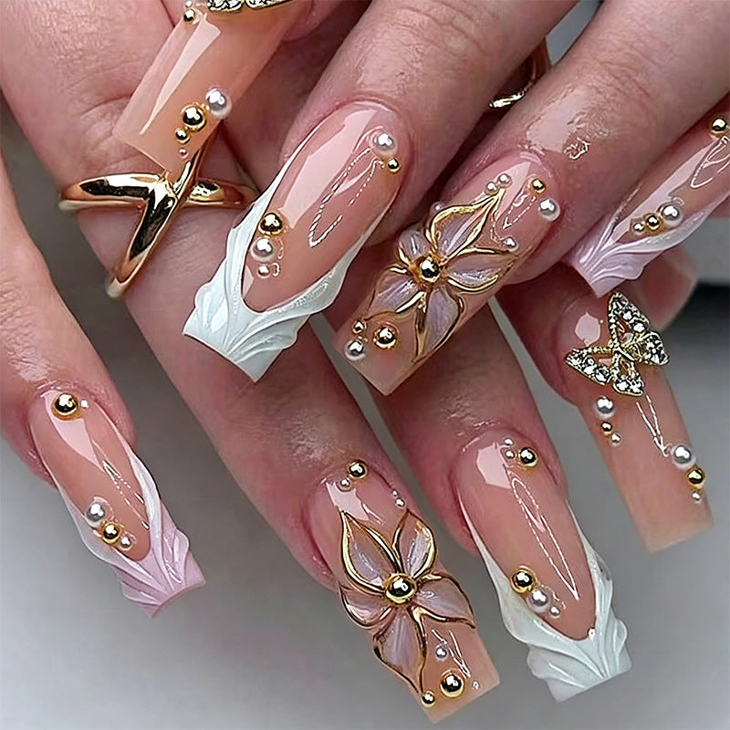 Artificial nail set with elegant floral and glitter decorations Acalora