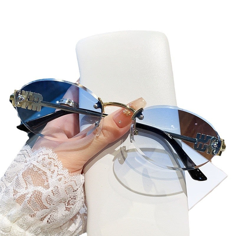 Women's fashionable sunglasses in an elegant oval design Karnz