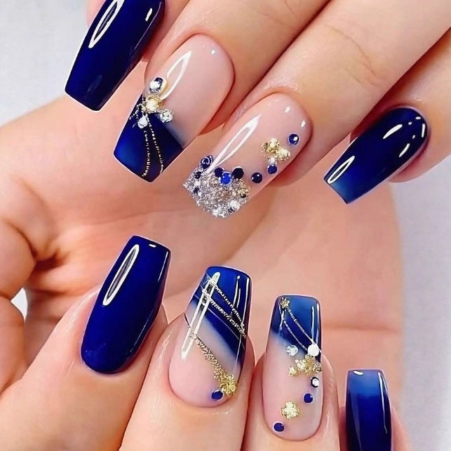 Artificial nails in a playful flower design with glittering accents Acalora