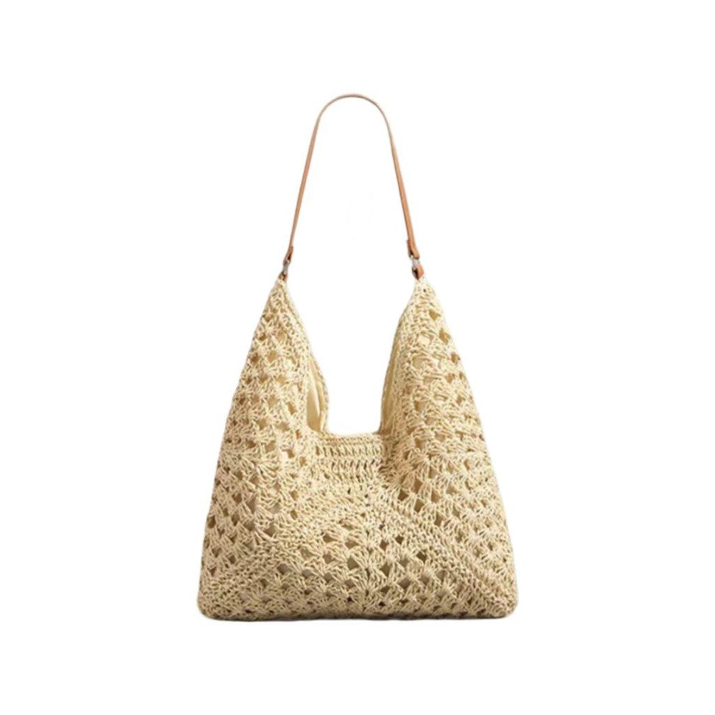 Handbag with artistic macrame design and flexible carrying comfort Skanto