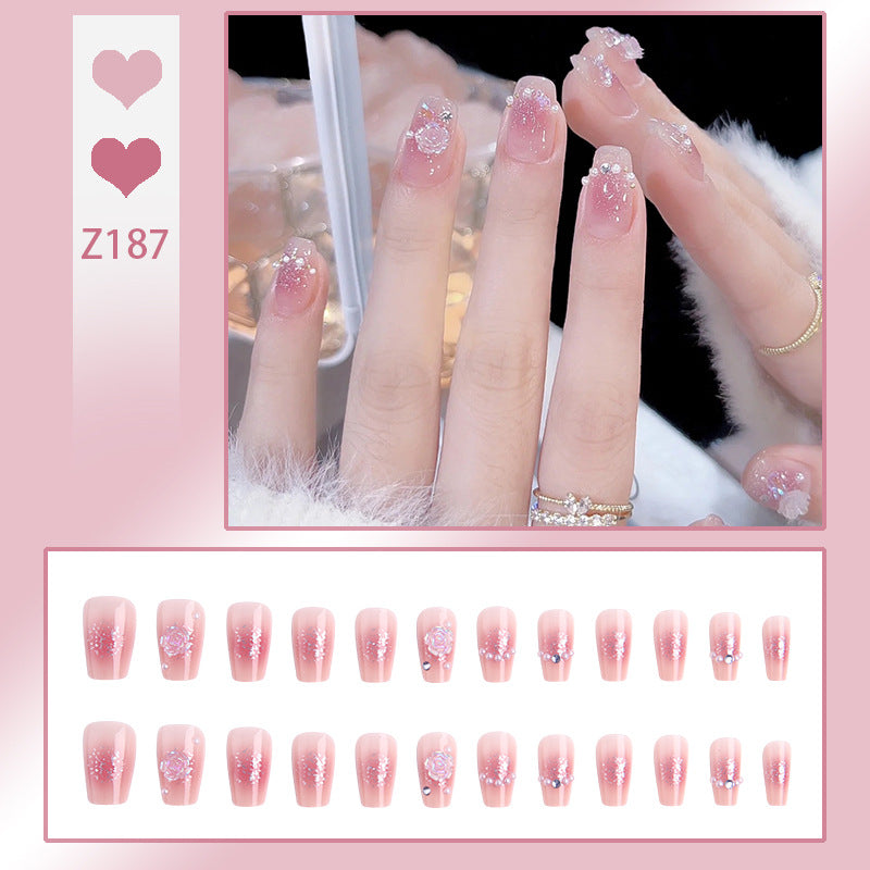 Artificial nail set with sparkling glitter and pearl decorations Acalora