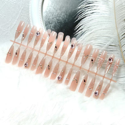 Artificial nails with glamorous crystal embellishments Acalora