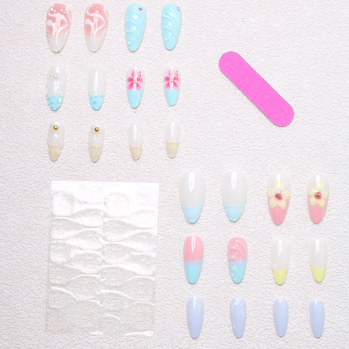 Artificial nail set with floral and shell-shaped designs Acalora