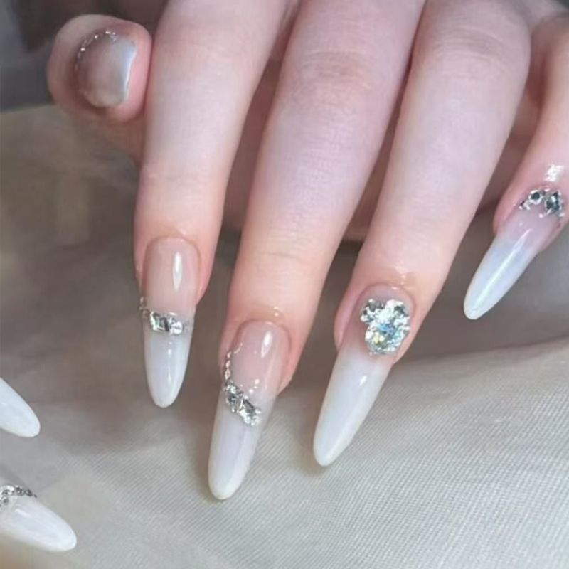 Glamorous artificial nail tips with elegant decorations Acalora