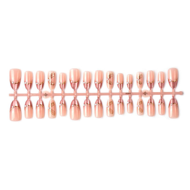 Nail set with glamorous golden accents and elegant design Acalora