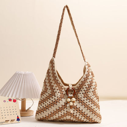 Women's handbag with intricate woven pattern Karnz