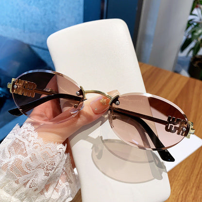 Women's fashionable sunglasses in an elegant oval design Karnz