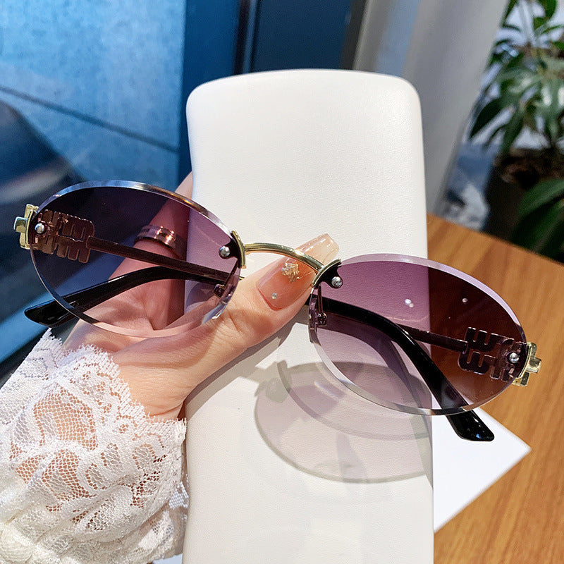 Women's fashionable sunglasses in an elegant oval design Karnz