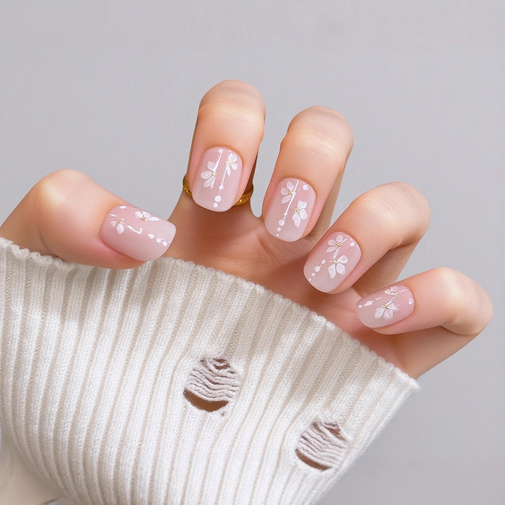 Delicate artificial nails with floral details Acalora