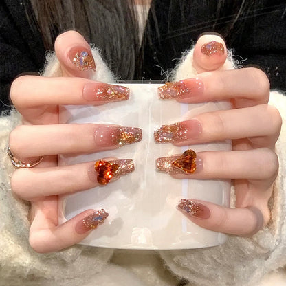 Artificial nail set with glitter and heart accents Acalora