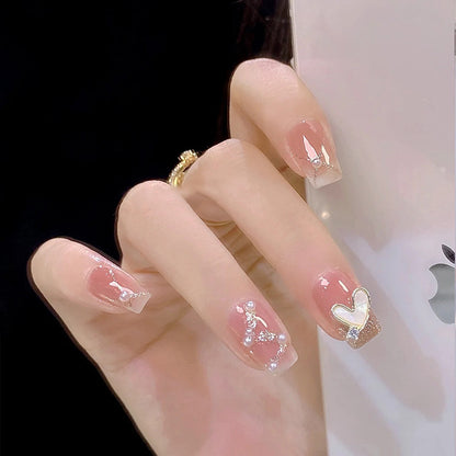Artificial nail set with elegant pearl and glitter accents Acalora