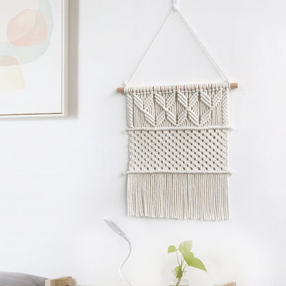 Handwoven macrame wall hanging in boho style
