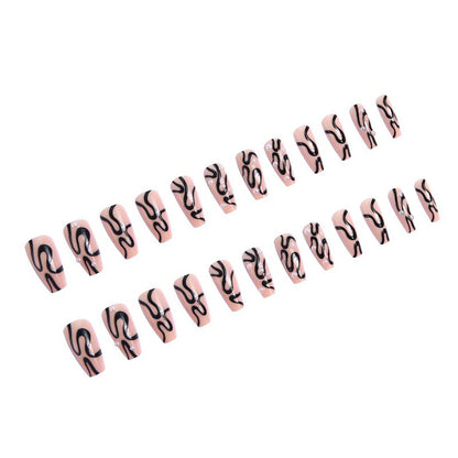 Artificial nail set with unique wave designs and glamorous accents Acalora