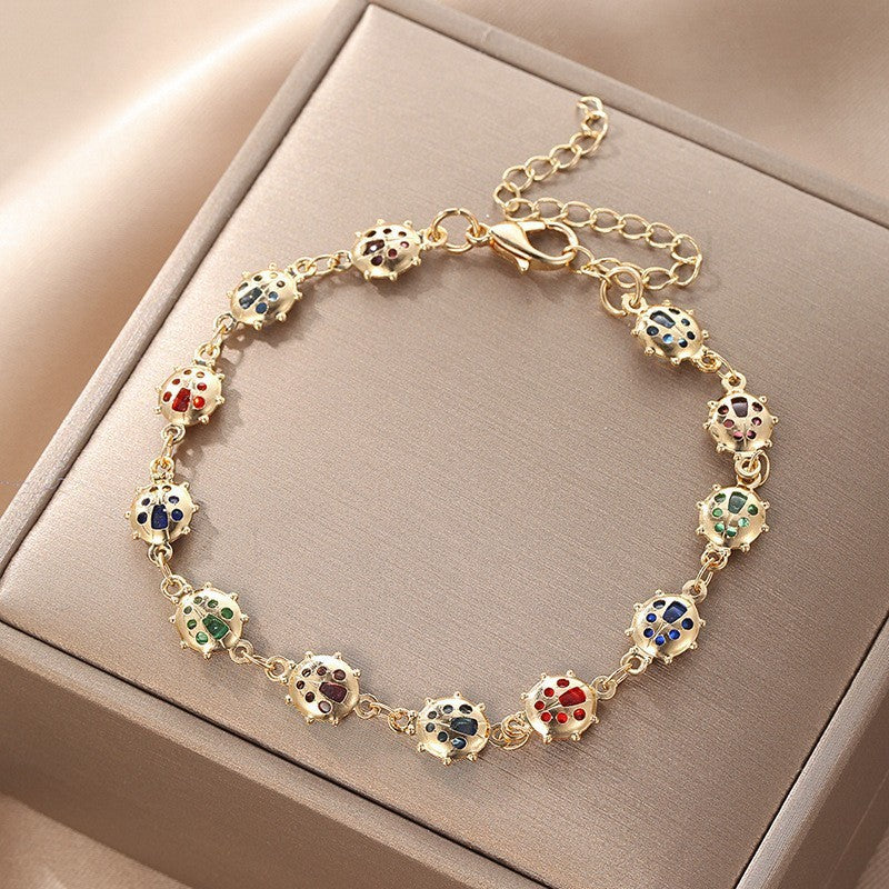 Butterfly and Daisy Charm Anklet Acalora