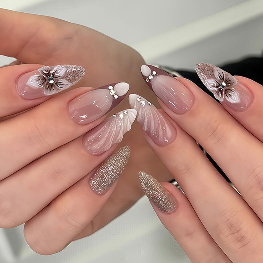 Artificial nails in elegant floral design with glitter accents Acalora