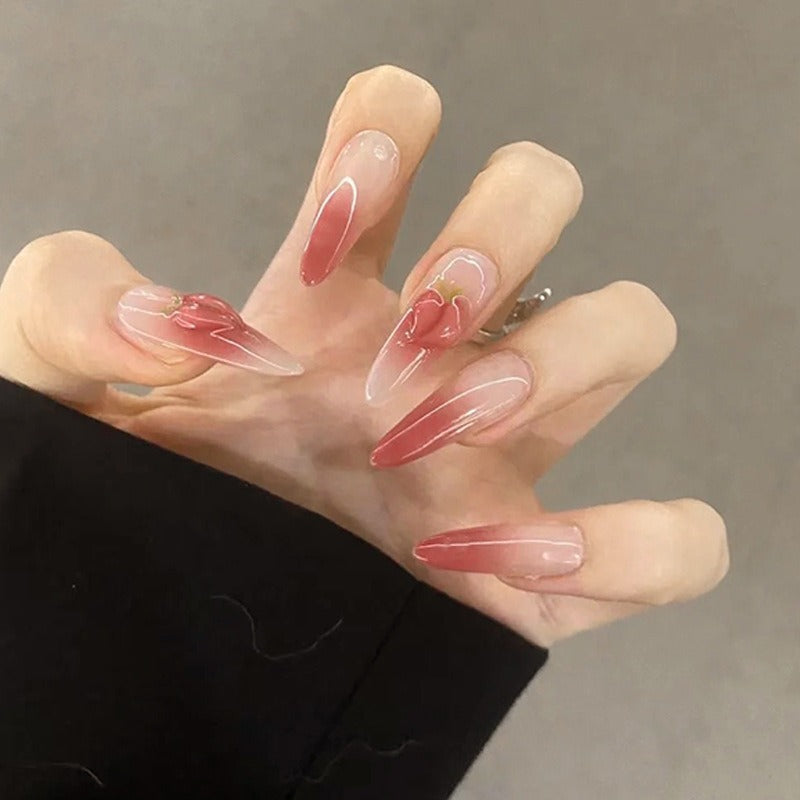 Nail set in elegant ombre design with artistic accents Acalora