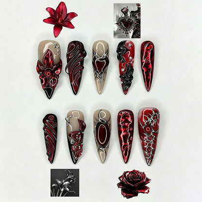 Artificial nail set with extravagant red and black designs Acalora